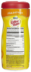 Coffee‑mate detalle de tapa abatible para vertido higiénico y controlado
