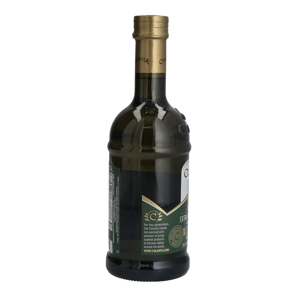 Colavita botella junto a ensalada para ilustrar uso en crudo