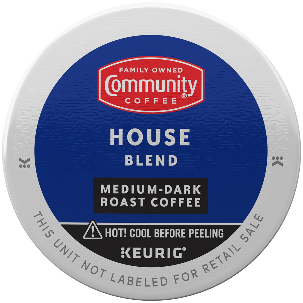 Community Coffee cápsula K-Cup™ primer plano, detalle de sellado y frescura