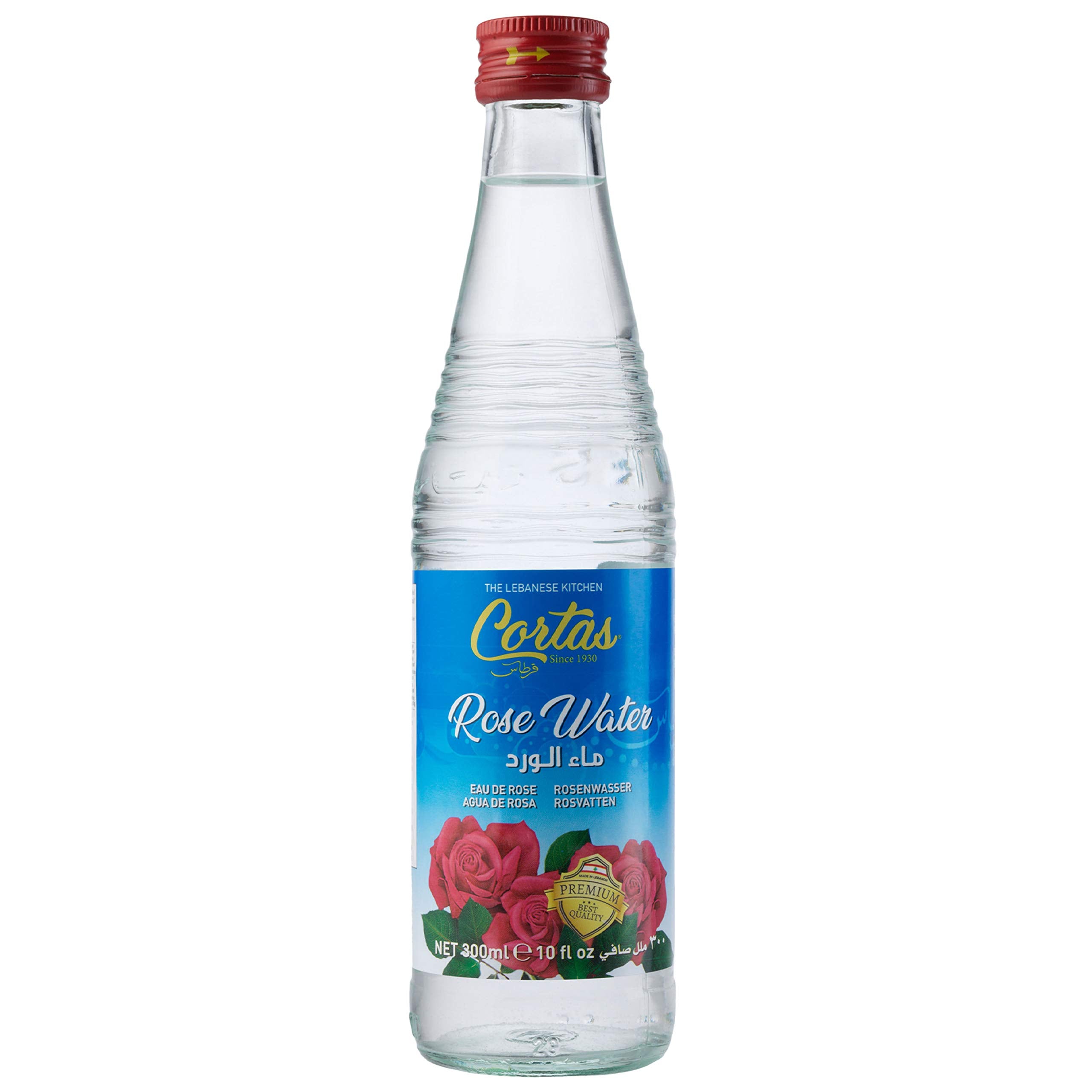Cortas detalle de gota de agua de rosas en cucharita demostrando pureza y aroma