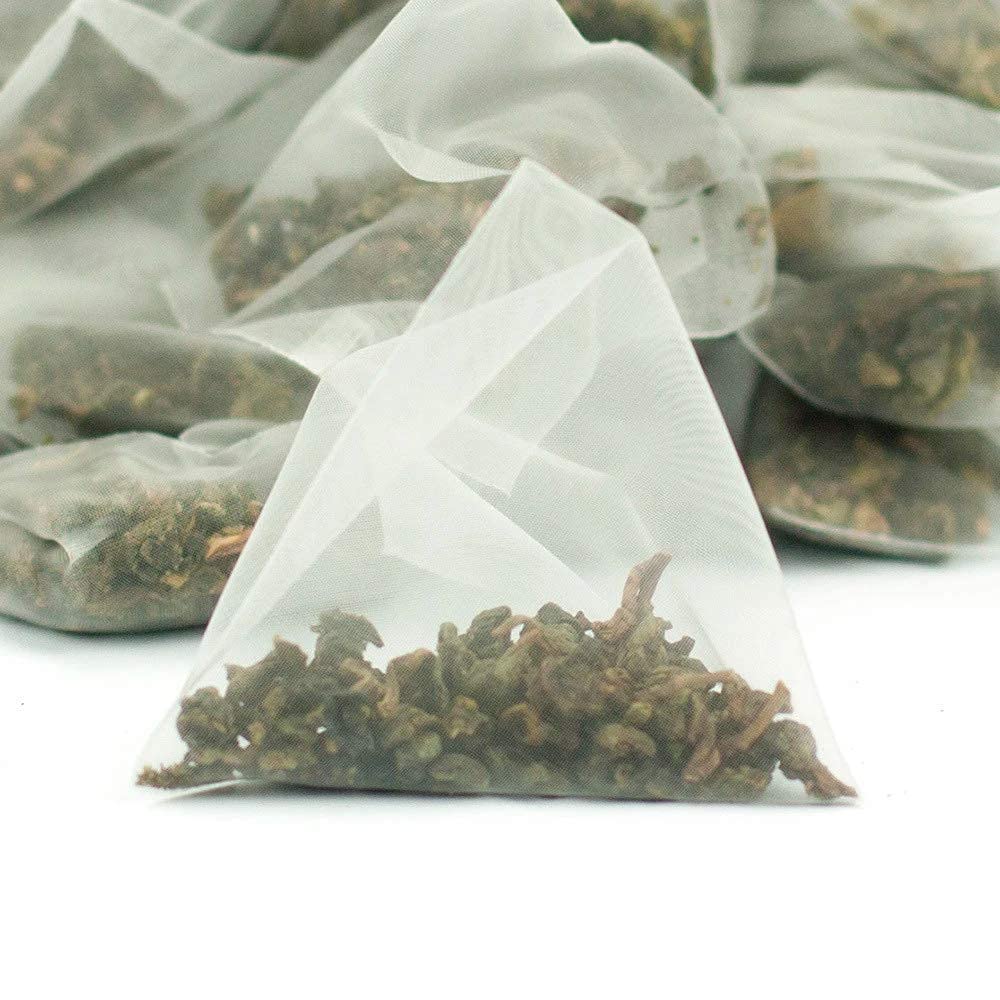 CUSHLA taza con infusión naranja-marrón destacando color y sabor