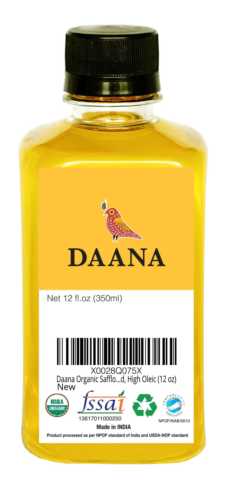 Daana vertiendo aceite sobre ensalada resaltando sabor suave y aderezo