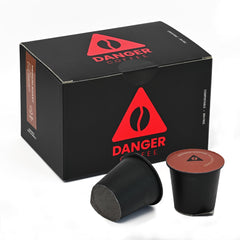 Danger Coffee empaque frontal mostrando 12 cápsulas y beneficio ecológico