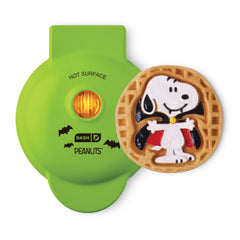 DASH Peanuts frontal verde mostrando diseño Snoopy vampiro y color festivo