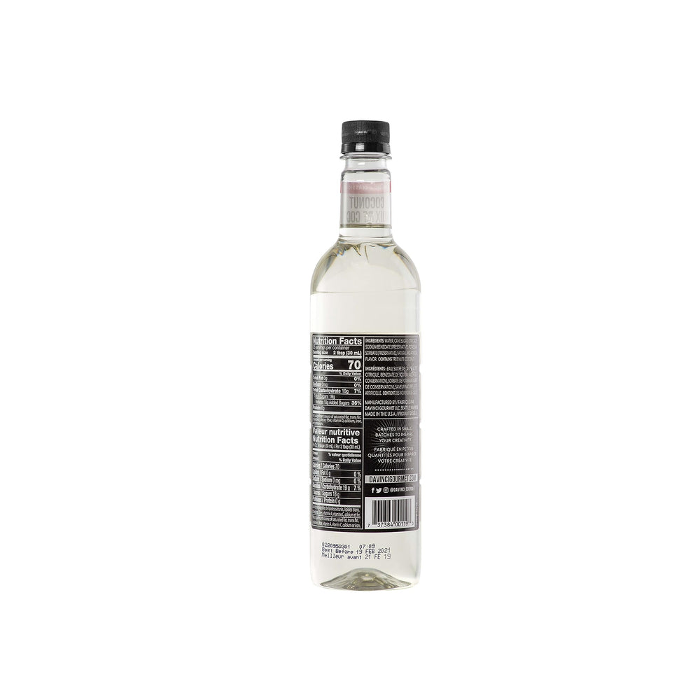 DaVinci Gourmet botella junto a una regla para comparar tamaño de 25,4 fl oz, indica escala