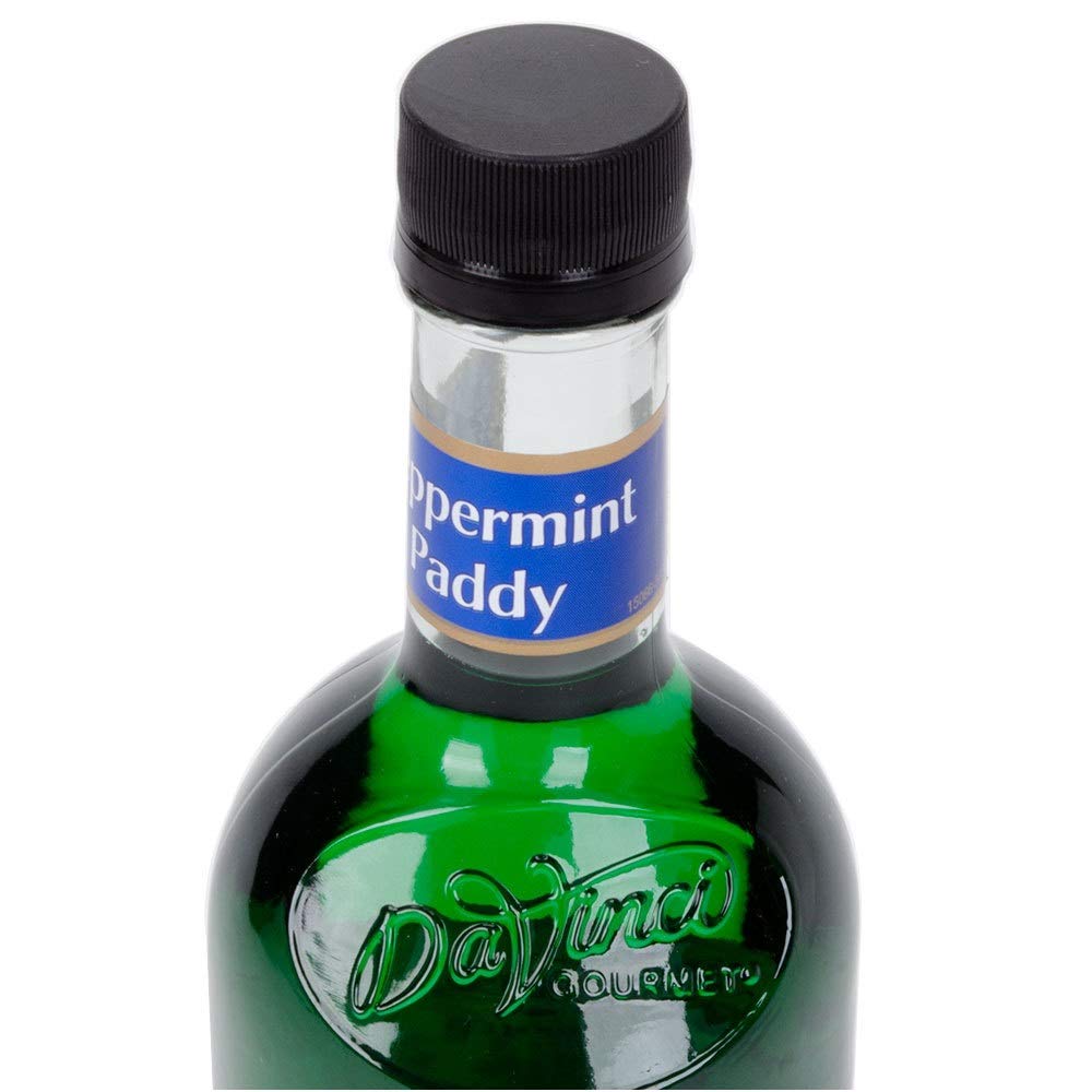 DaVinci Gourmet botella junto a una taza para comparar tamaño 750 mL práctico