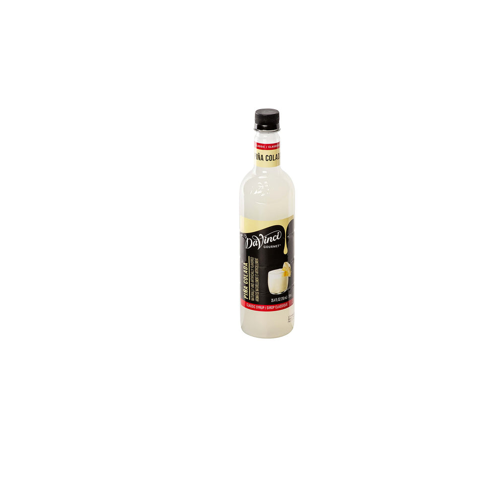 DaVinci Gourmet botella junto a objetos cotidianos para comparar el tamaño práctico