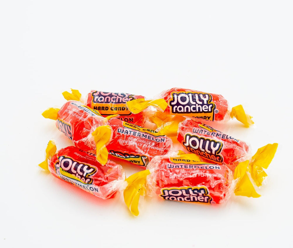 Donty-Tonty mano sosteniendo caramelo para mostrar tamaño real y porción