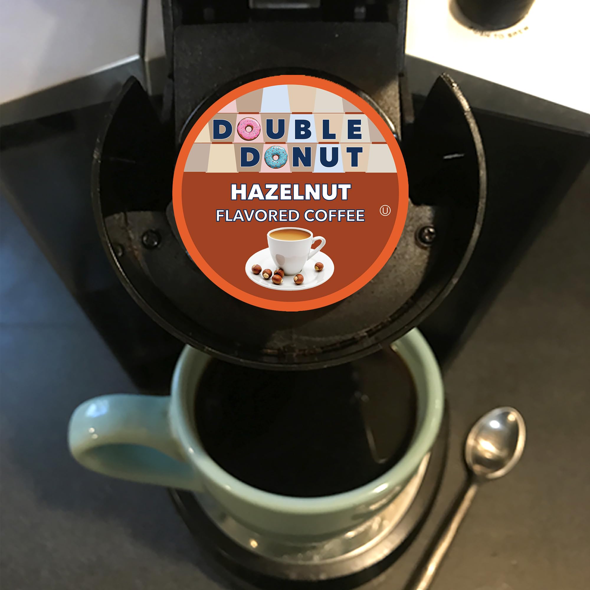 Double Donut caja 24 unidades junto a una regla para comparar tamaño