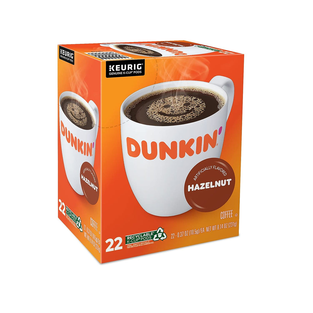 Caja Dunkin' Hazelnut junto a regla para comparar tamaño y porciones por caja