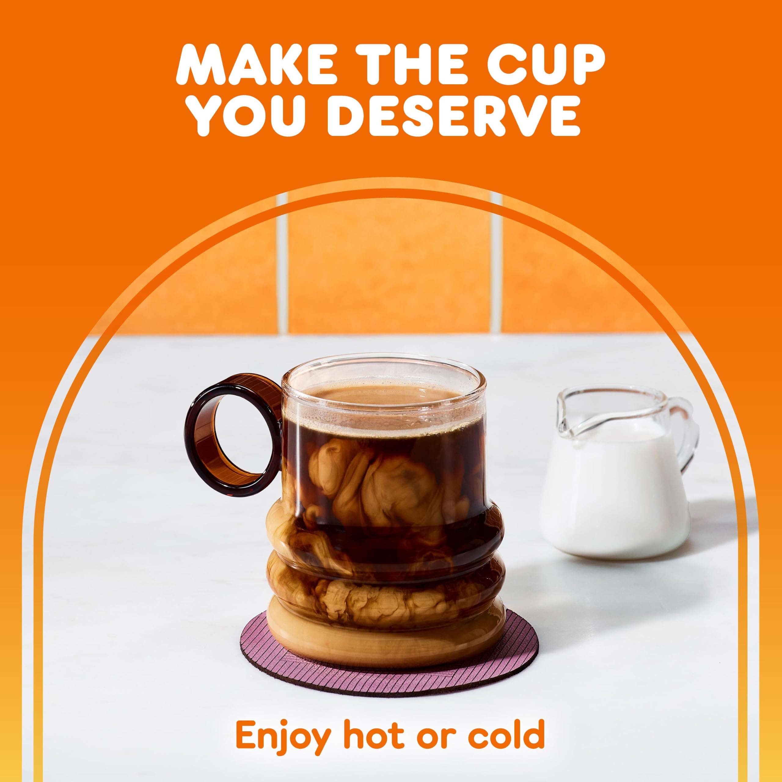 Dunkin' cápsula junto a una regla, muestra tamaño práctico