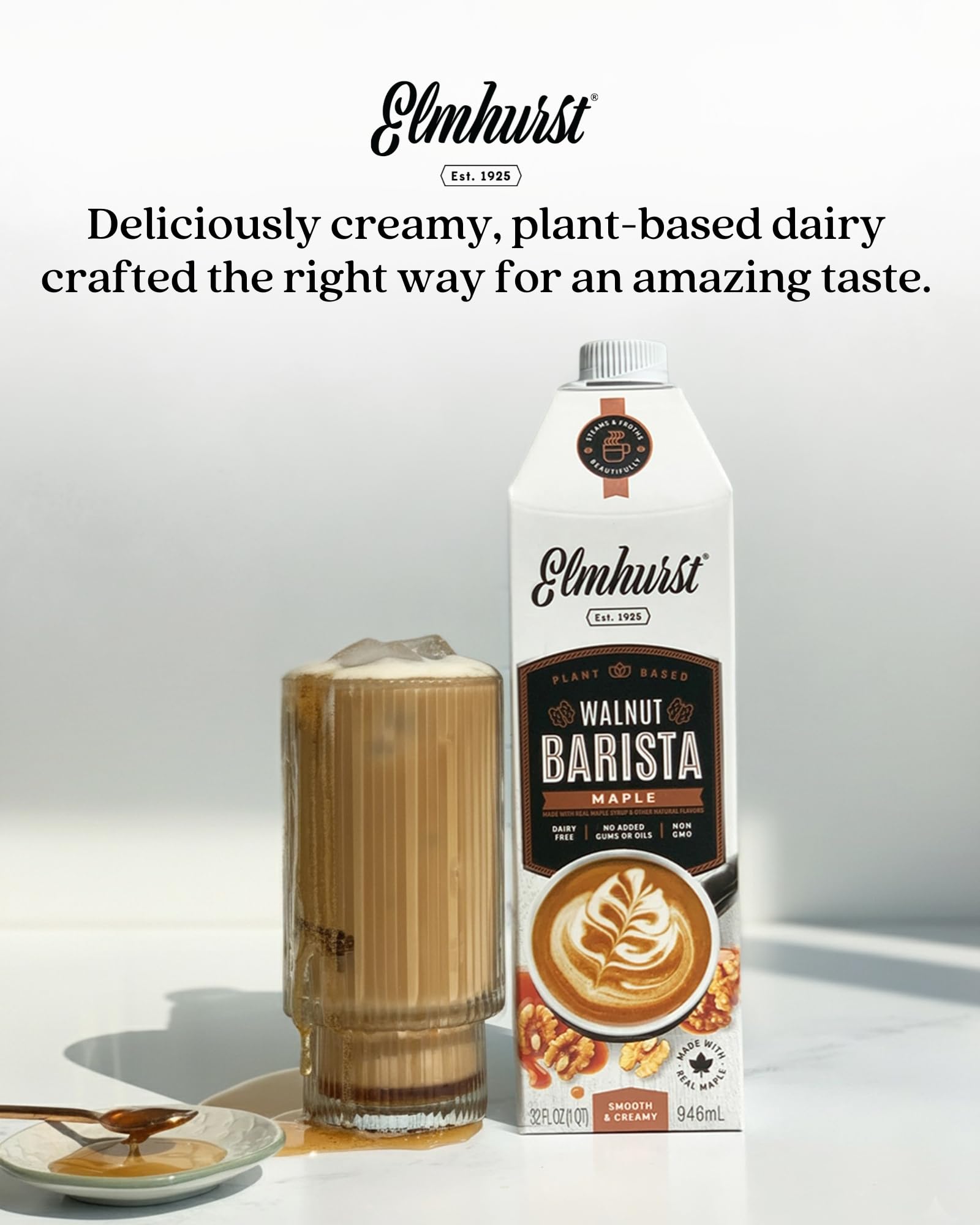 Elmhurst envase de 32 oz comparado con una mano para escala