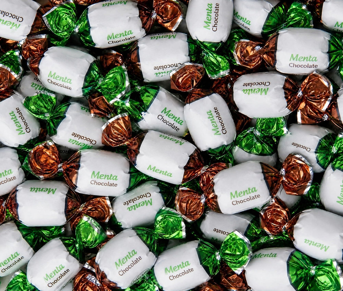 EMPORIUM CANDY TASTY TREATS FOR THE TUMMY paquete frontal mostrando cantidad 2 libras y envases, conveniencia