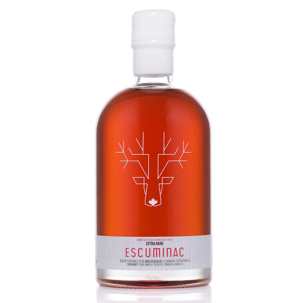 Escuminac botella 500 ml al frente mostrando vidrio premium y presentación elegante
