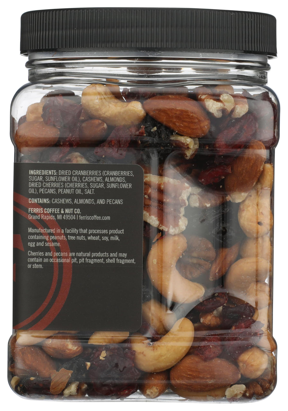 Ferris Coffee & Nut frasco junto a mano para mostrar tamaño práctico