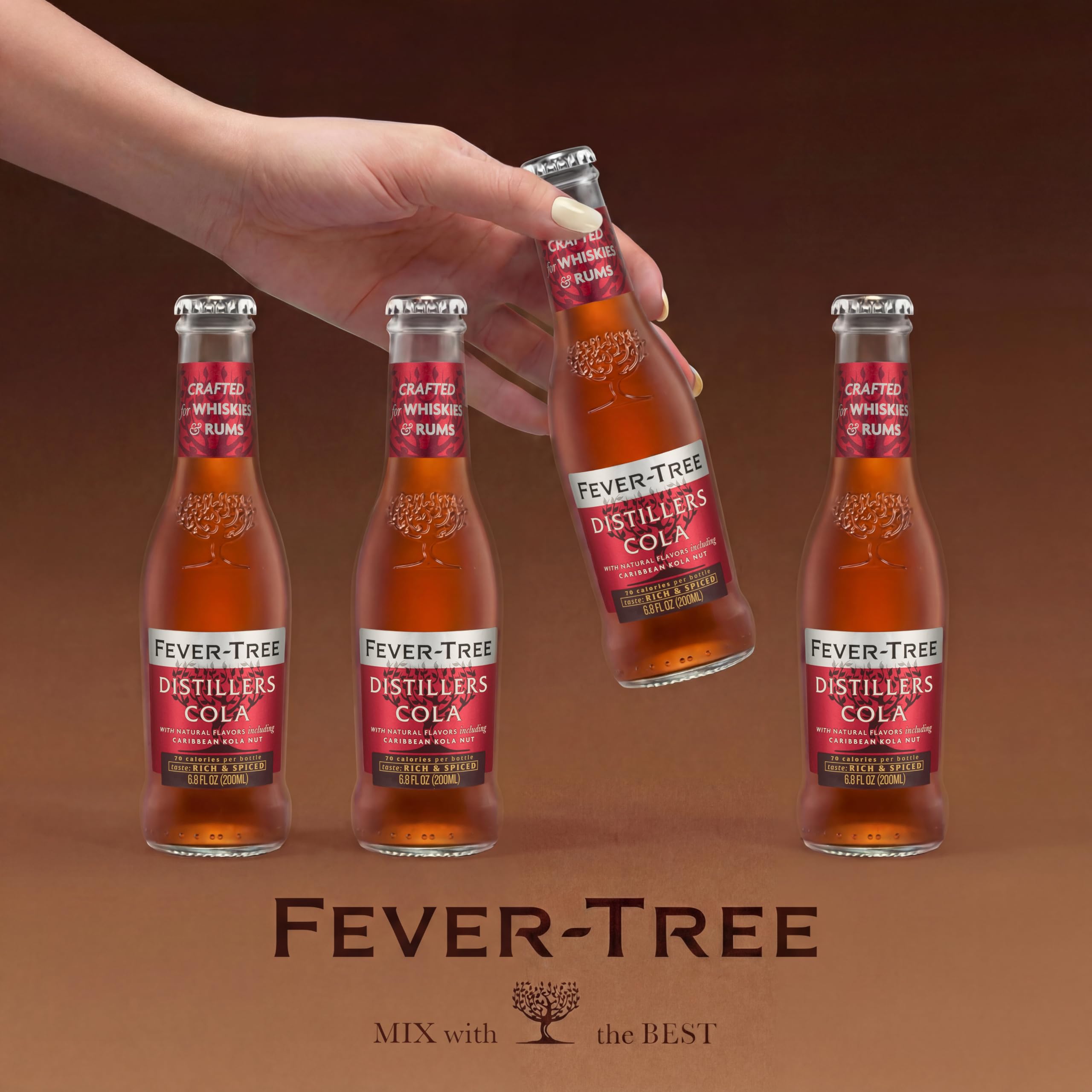 Fever-Tree Distillers Cola servida en copa con hielo realzando sabor