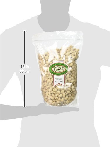 Fiddyment Farms pistachos en mano para comparar tamaño y escala fácilmente