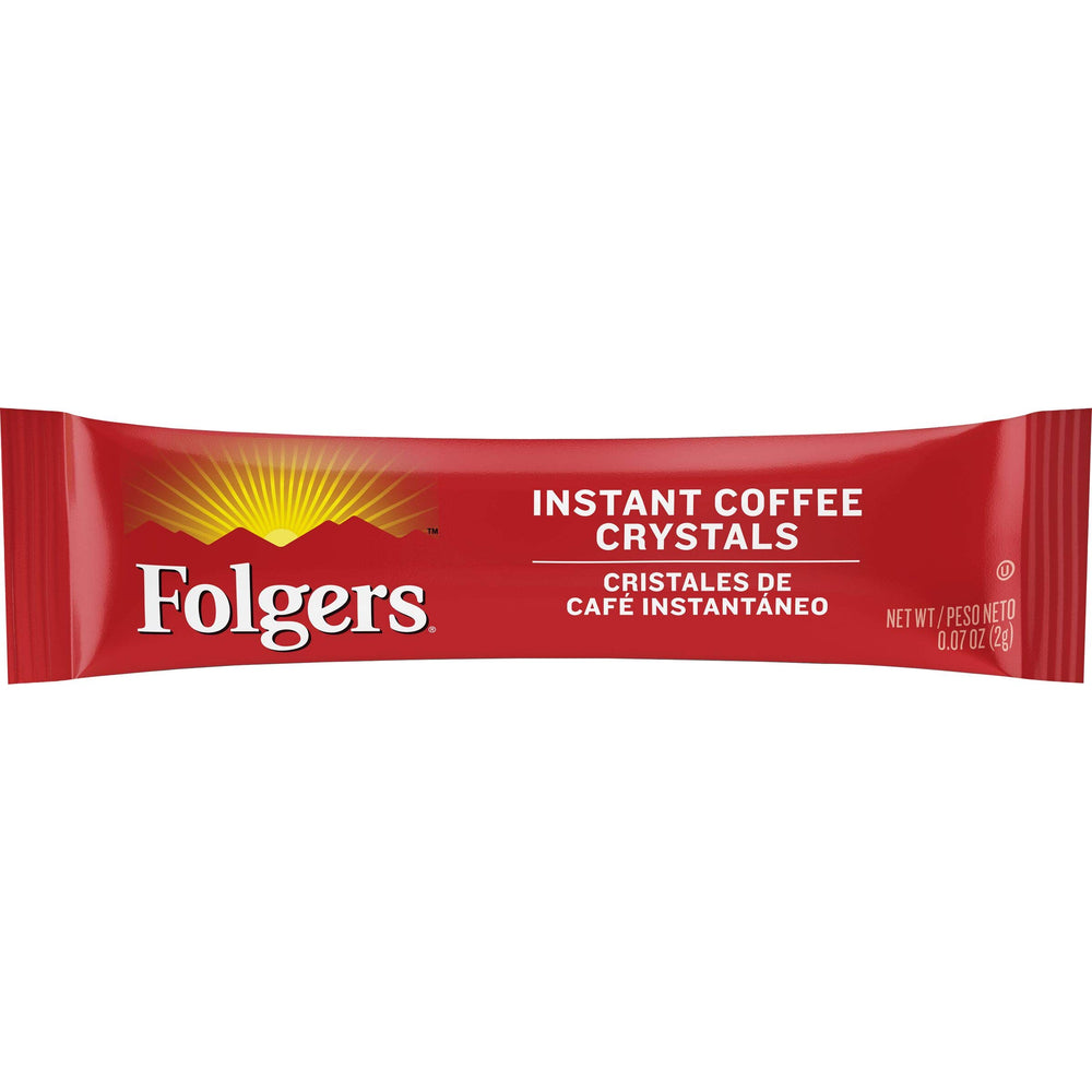 Folgers cristales de café en cuchara mostrando disolución rápida