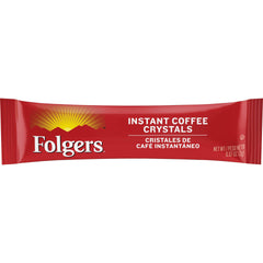 Folgers cristales de café en cuchara mostrando disolución rápida
