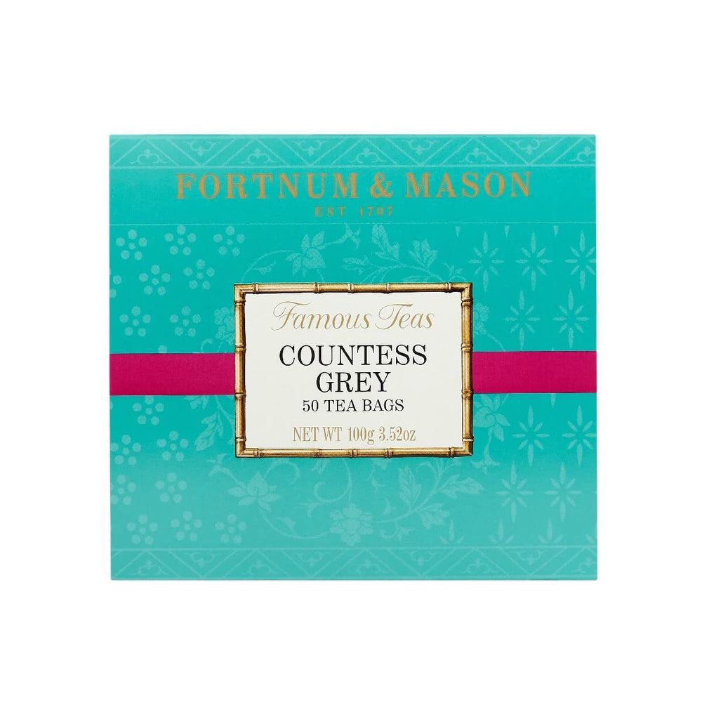 Fortnum & Mason bolsita individual junto a hojas, muestra aroma cítrico