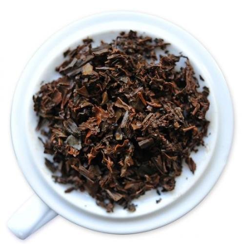 Fortnum & Mason taza servida con té Royal Blend acompañada de bollería para desayuno