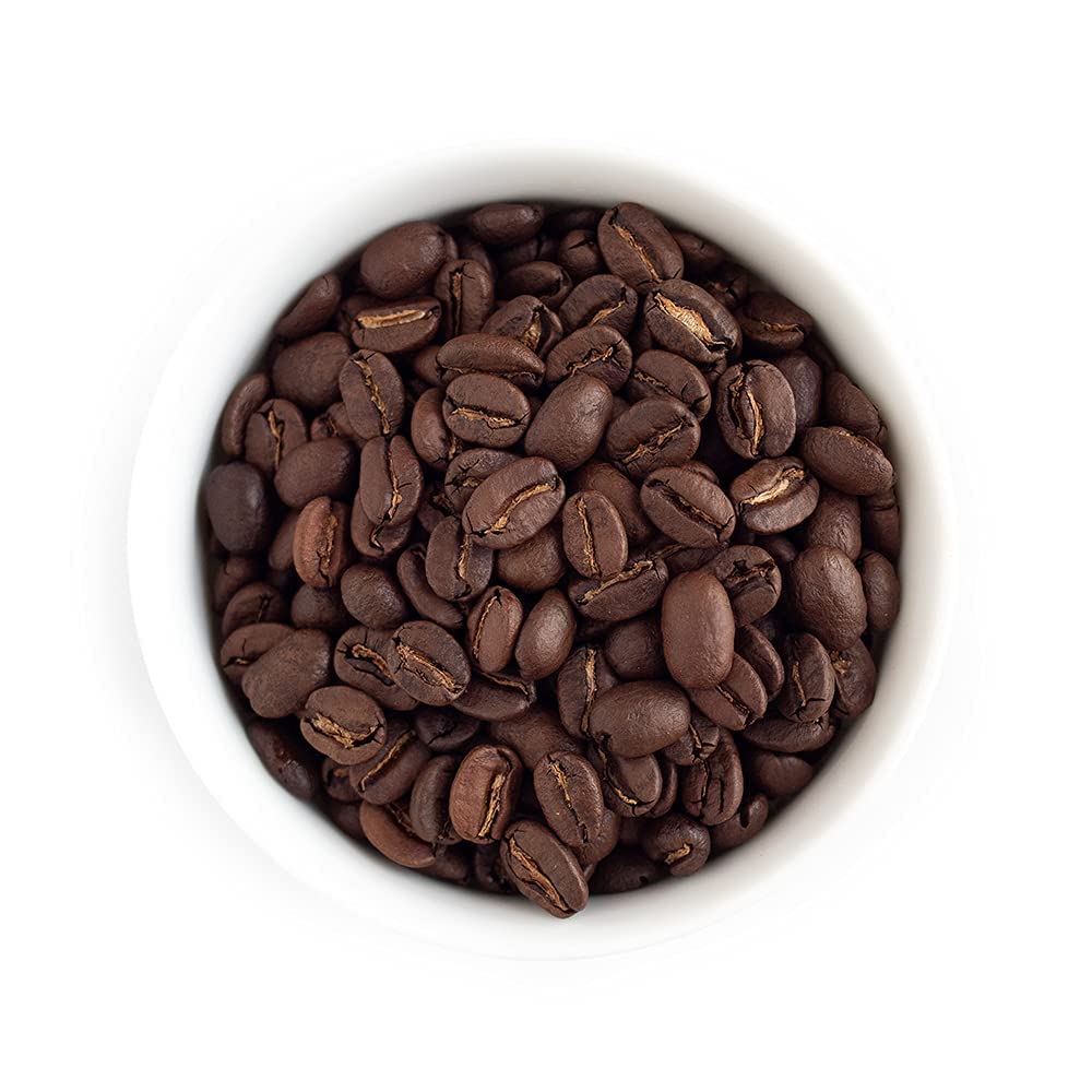 Fresh Roasted Coffee granos enteros primer plano que conservan frescura
