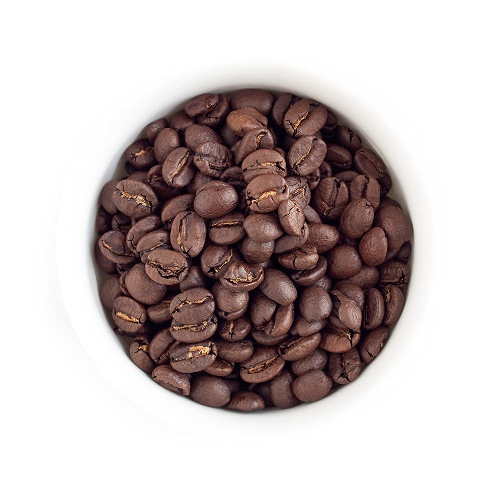 Fresh Roasted Coffee primer plano de granos Kenya AA resaltando aroma