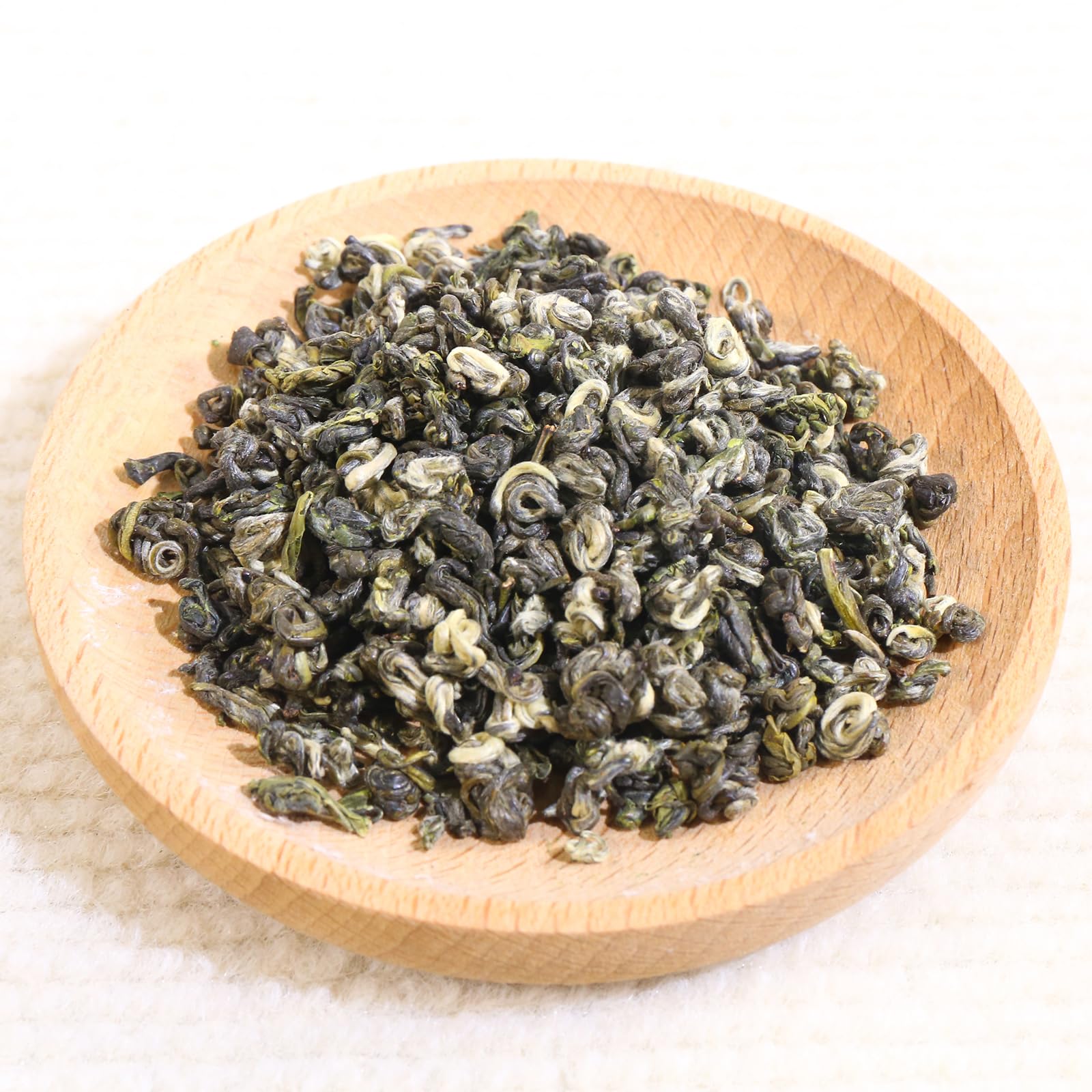 FullChea infusión verde claro en taza, sabor suave y limpio
