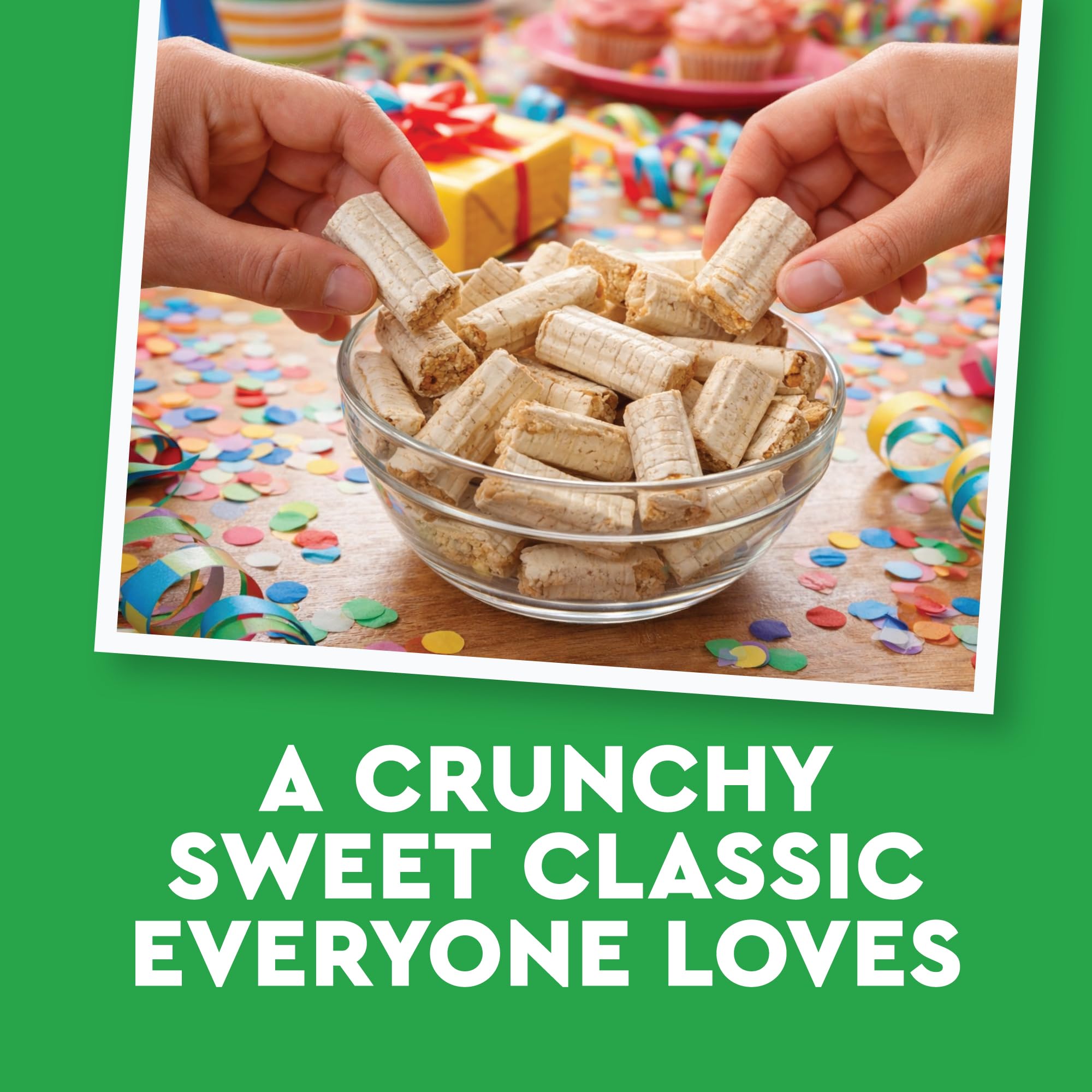 Fusion Sweets And Snacks barras junto a una mano para escala real