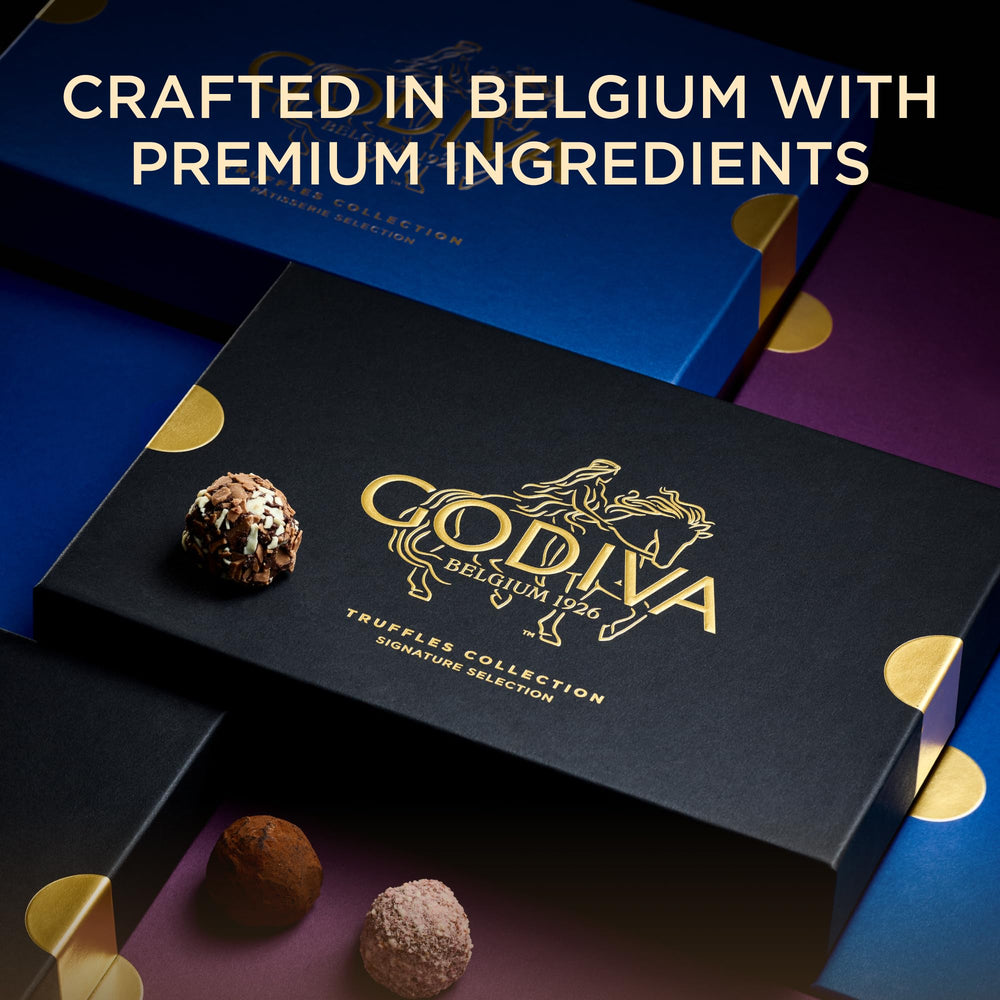 Godiva trufa en mano para comparar tamaño, ideal para compartir y degustar