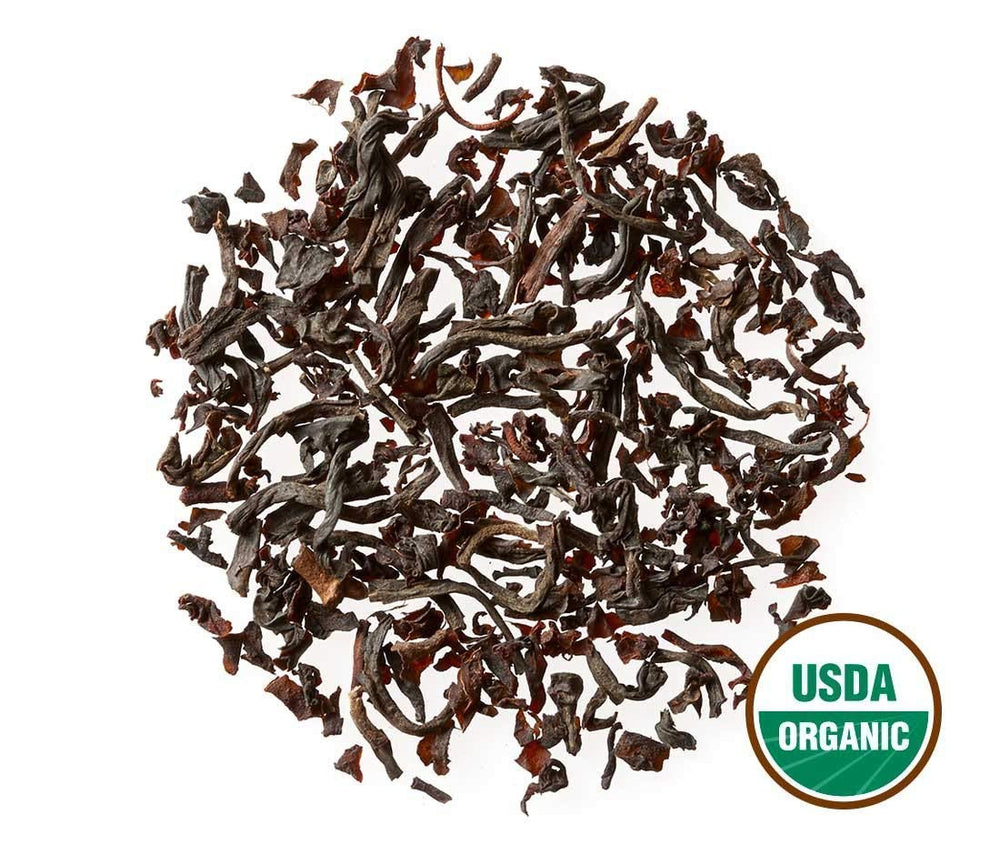 Golden Moon Tea hojas a granel resaltando mezcla de cuatro tés