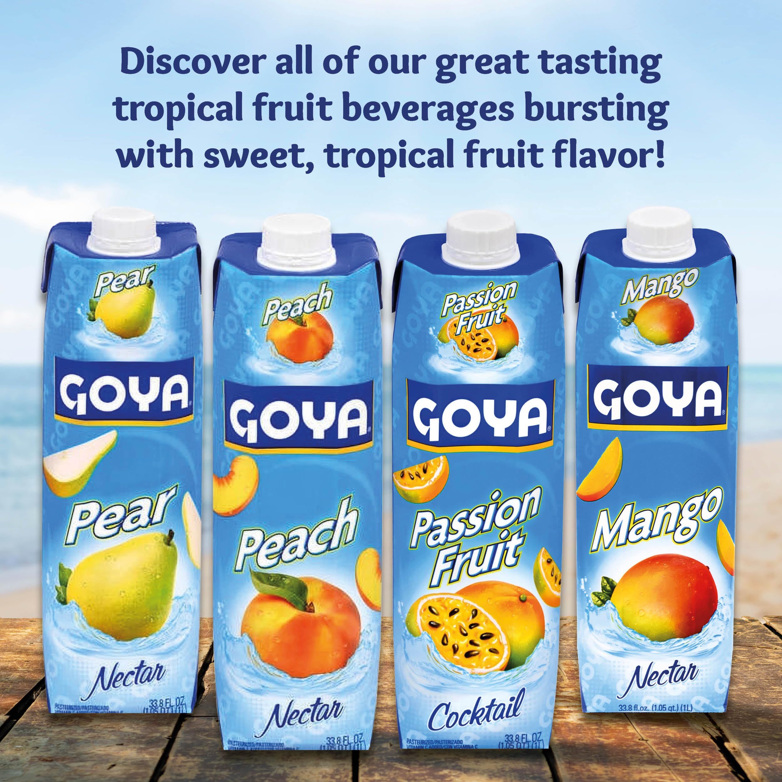 Goya botella en encimera de cocina con frutas y utensilios de receta