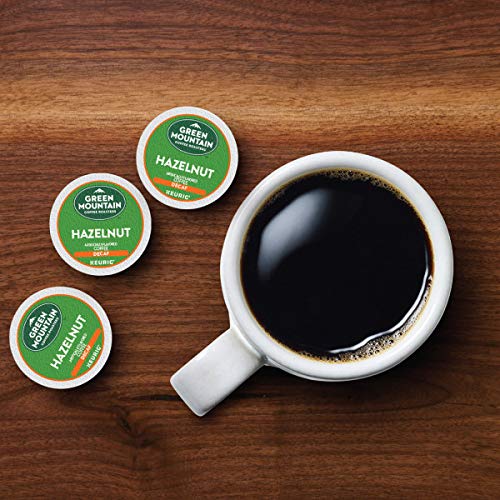 Green Mountain Coffee Roasters cápsula en mano para comparar tamaño y facilidad de uso