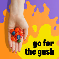 Gushers gomitas en mano mostrando textura masticable y tamaño