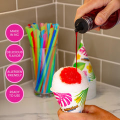 Hawaiian Shaved Ice primer plano de las tres botellas mostrando etiquetas y colores vibrantes