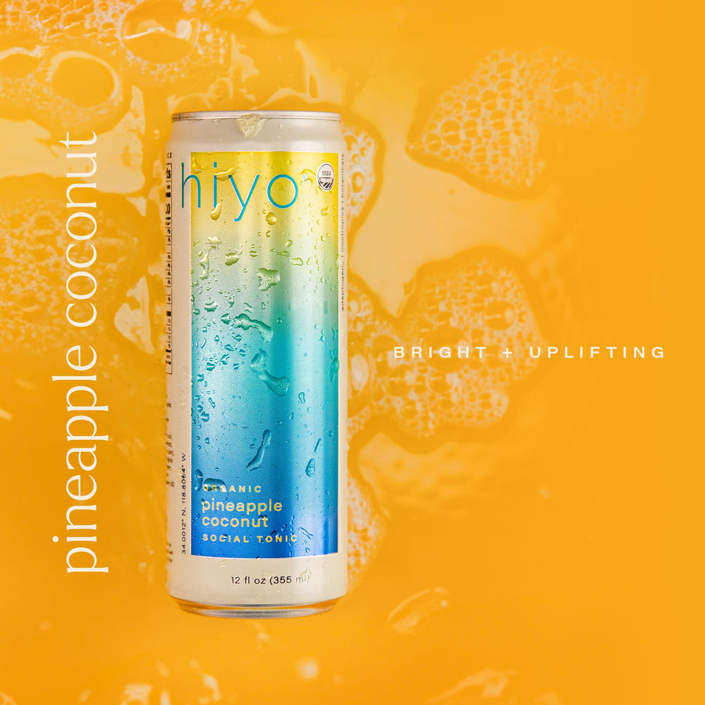 HIYO lata abierta con efervescencia que sugiere sabor tropical y refresco