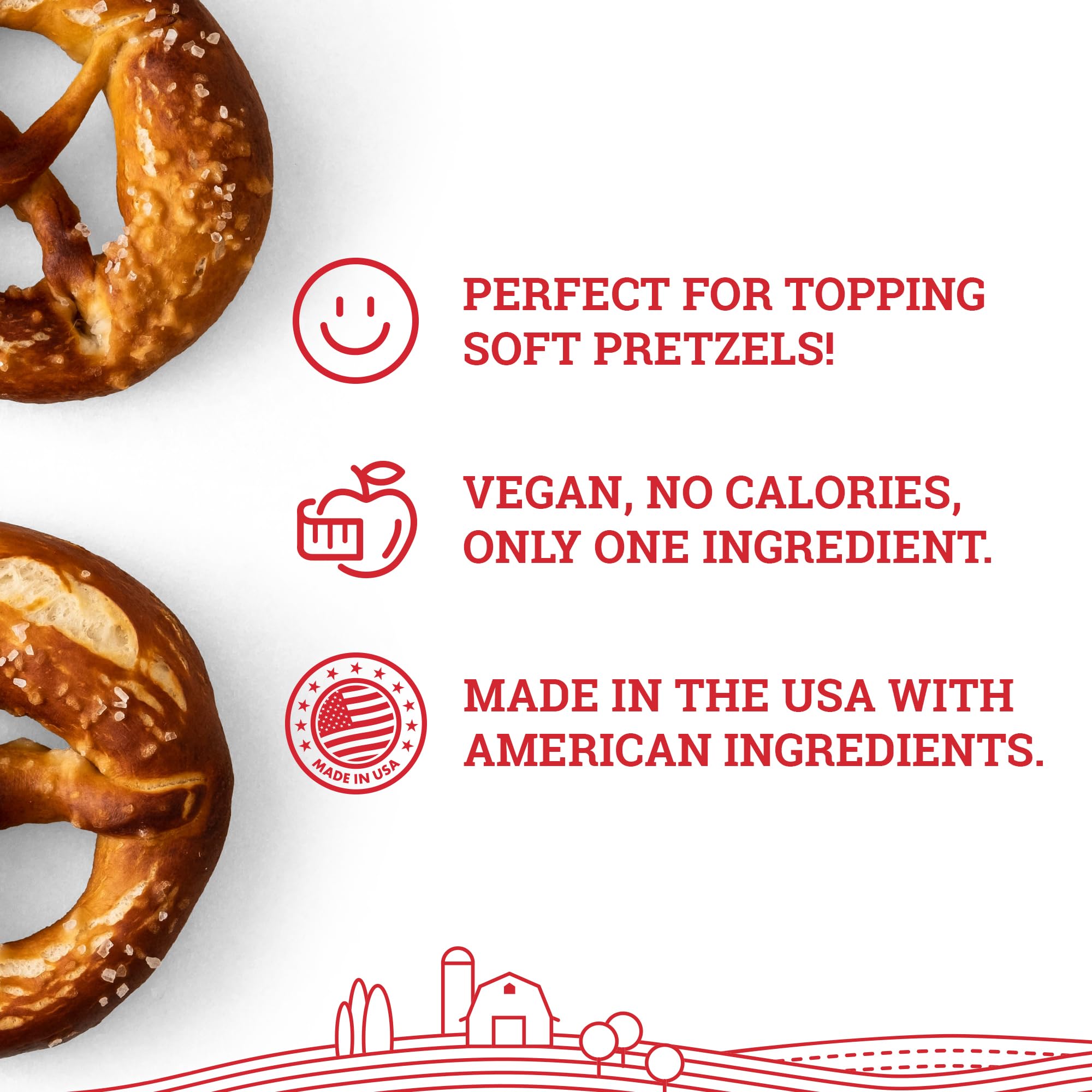 Hoosier Hill Farm mano espolvoreando sal sobre pretzel para sabor y textura