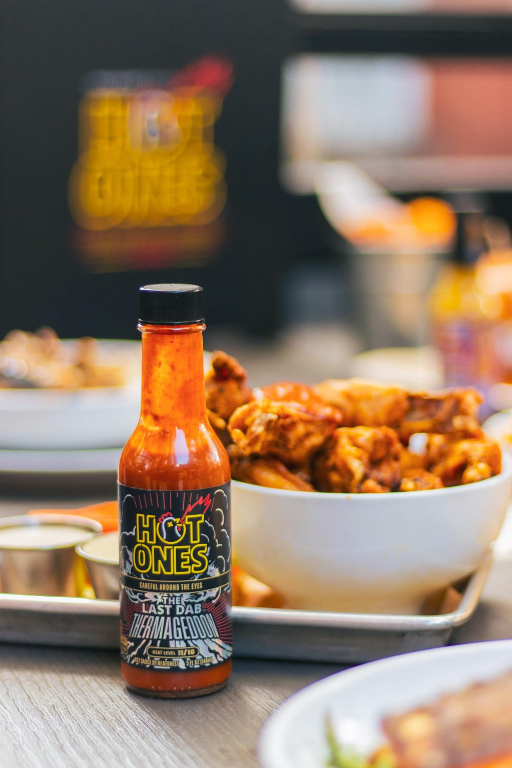 Hot Ones Amarillo con Scotch Bonnet gota mostrando sabor tropical