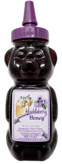 Huckleberry Haven frasco oso frontal mostrando etiqueta y facilidad de uso