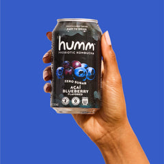 Humm lata abierta con espuma que sugiere frescura y textura ligera