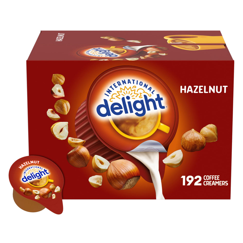 International Delight frente del paquete mostrando 192 cápsulas y beneficio de almacenamiento