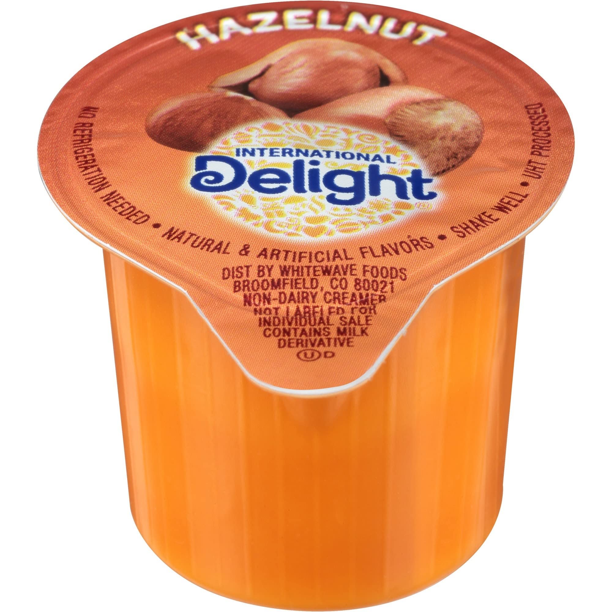 International Delight cápsulas en dispensador de oficina, beneficio de uso profesional