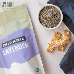 J MAC BOTANICALS bolsa de 32 oz junto a una regla para escala