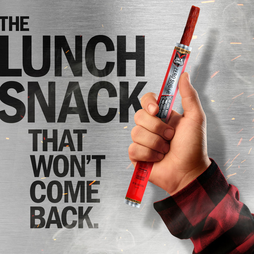Jack Link's palito junto a una regla para comparar tamaño y porciones