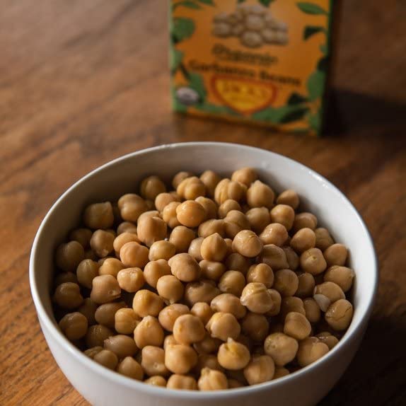 Jack's Quality Jack's Beans comparación tamaño en mano demostrando porción práctica