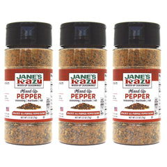 Jane's Krazy frasco en mano para apreciar tamaño 2.5 oz y uso fácil