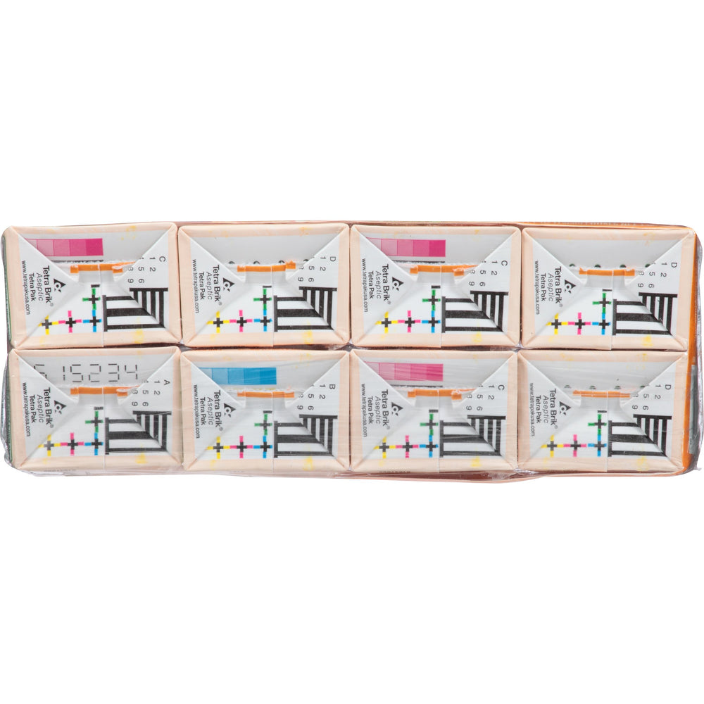 Juicy Juice caja en mano para comparar tamaño práctico por porción