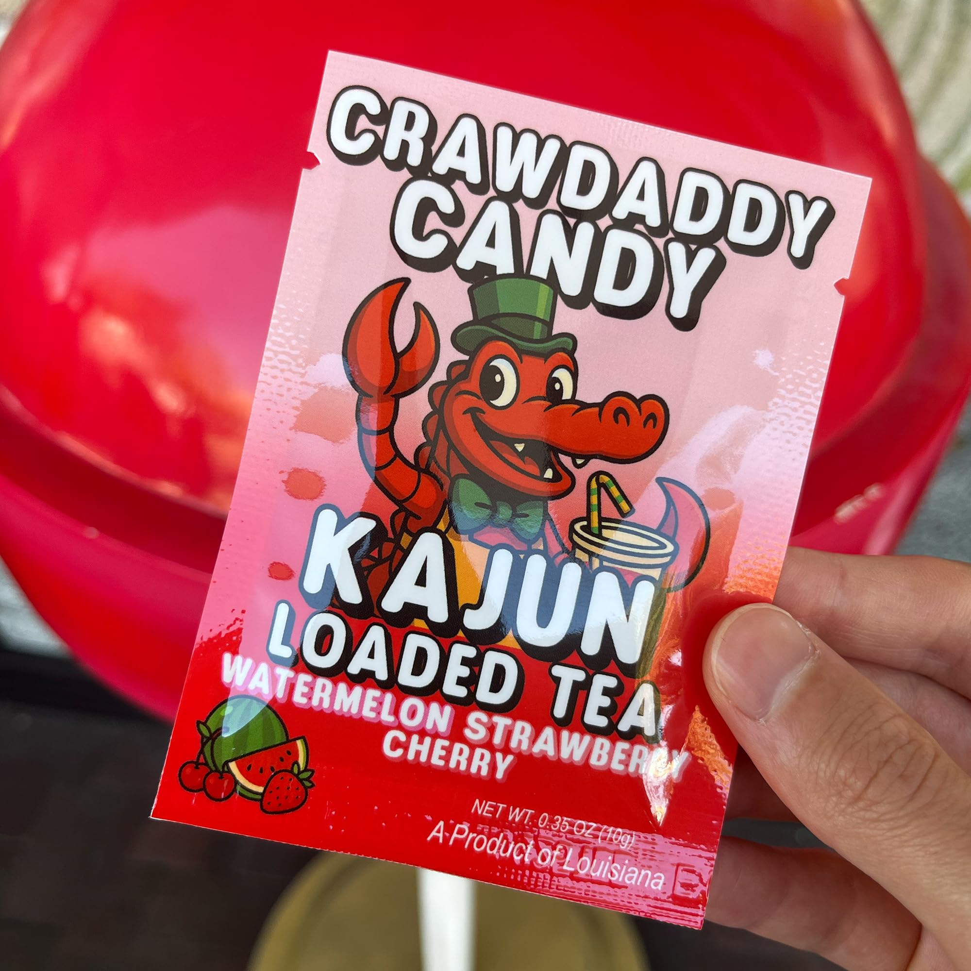 KaJun LOADED TEA sobre en mano para mostrar tamaño portátil