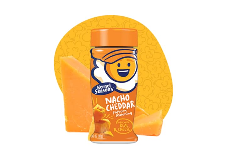 Kernel Season's sazonador sobre palomitas recién hechas, realza sabor
