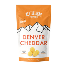 Kettle Head Popcorn frente del paquete Denver Cheddar, invita a probar